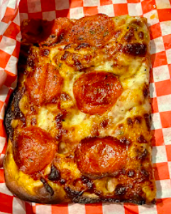 Golden Boy Pizza signature dishes Clam and Garlic Pizza
Pepperoni Slice
Sausage Pizza